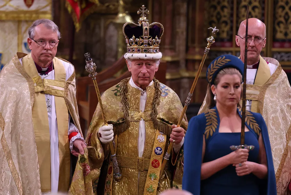 102930440 britains king charles iii walks wearing st edwards crown during the coronation ceremony