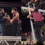 Gusttavo Lima se diverte com dificuldade de Guilherme ao descer escada em show