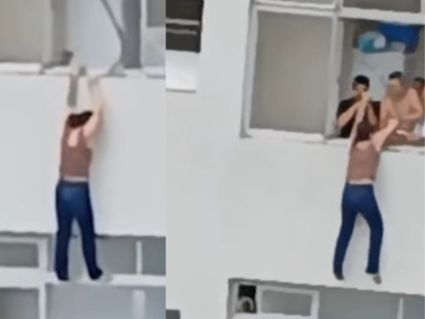 Mulher escorrega e fica pendurada em janela após tentar limpar vidro