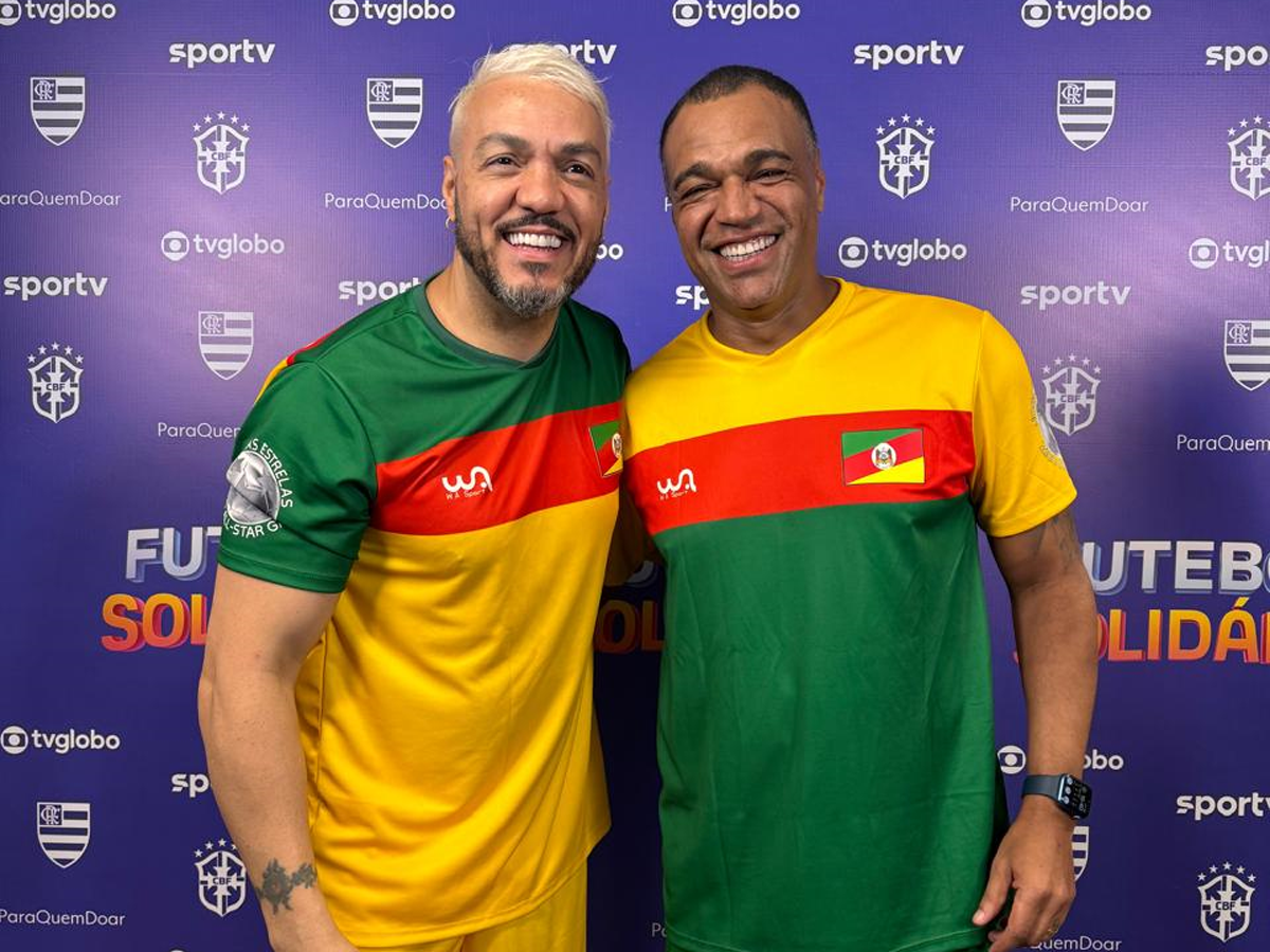 Belo e Denílson em reencontro antes de jogo solidário. Foto: Reprodução