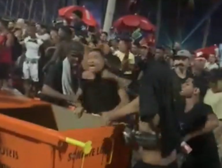 Público rende suposto ladrão e o atira no lixo durante show da Madonna