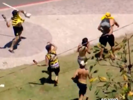 Torcedores do Peñarol entram em confronto com a polícia em praia no Rio