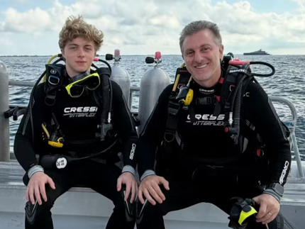 Luciano Huck e Benício mergulham com tubarões e Angélica reage