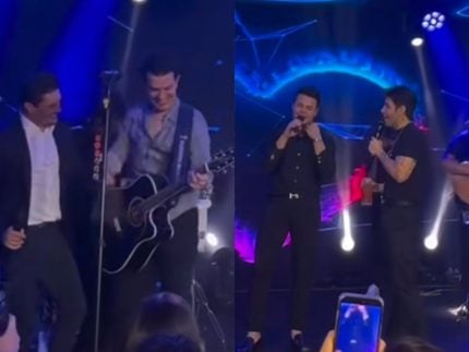 Matheus, Jorge, Hugo, Guilherme e George Henrique sobem ao palco juntos em festa