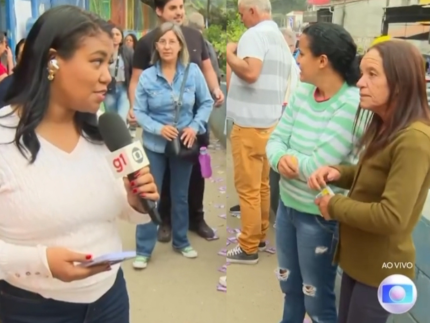 Repórter da Globo flagra mulher fazendo boca de urna ao vivo, durante reportagem